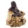 Goldener Buddha mit Kette, sitzend auf Reichtum